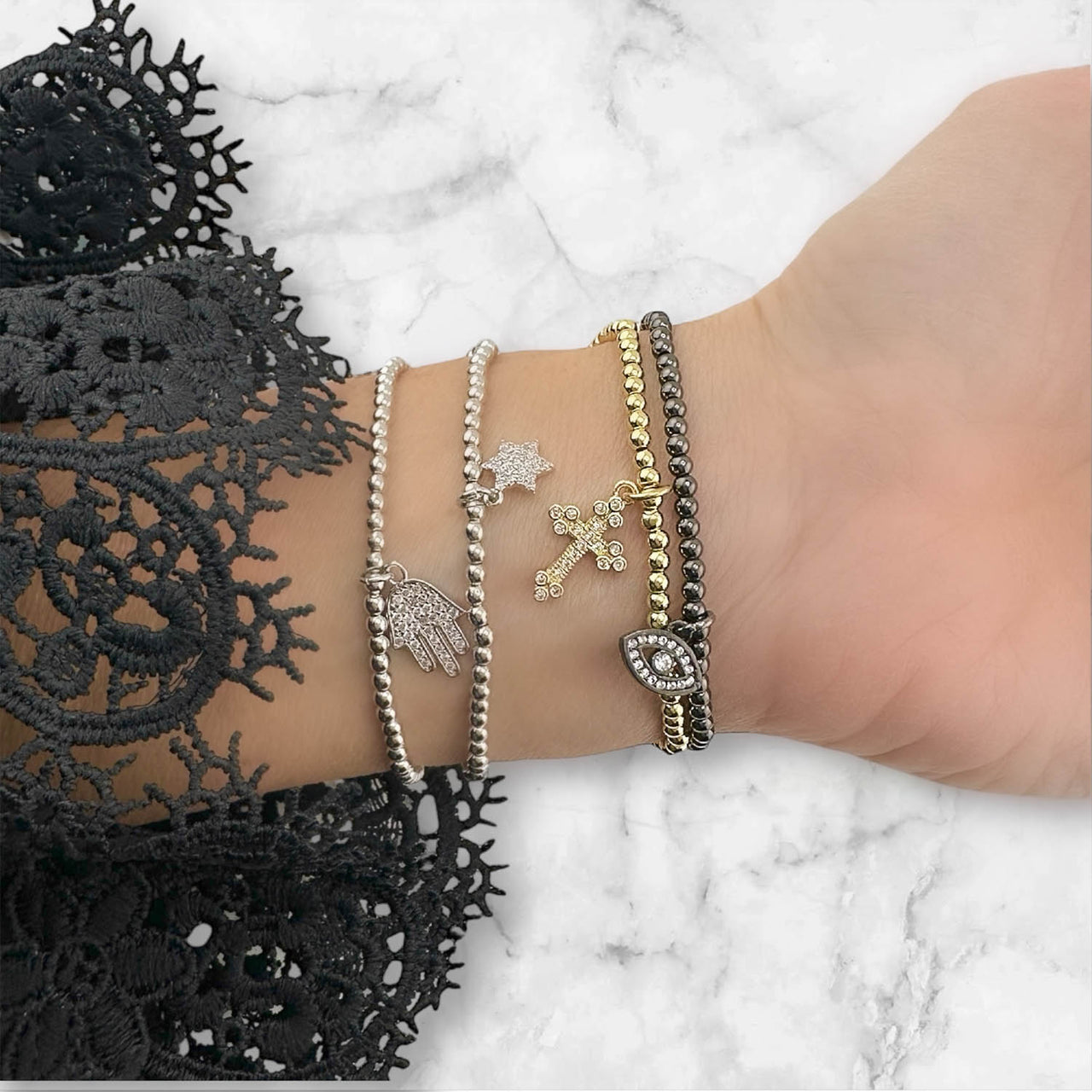 sami luxe religious bracelet collection layered on wrist 3mm beaded bracelets love lisa
