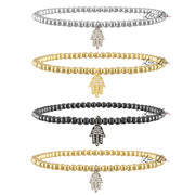 3mm beaded bracelet with pave hamsa charm shown in silver, gold and gunmetal