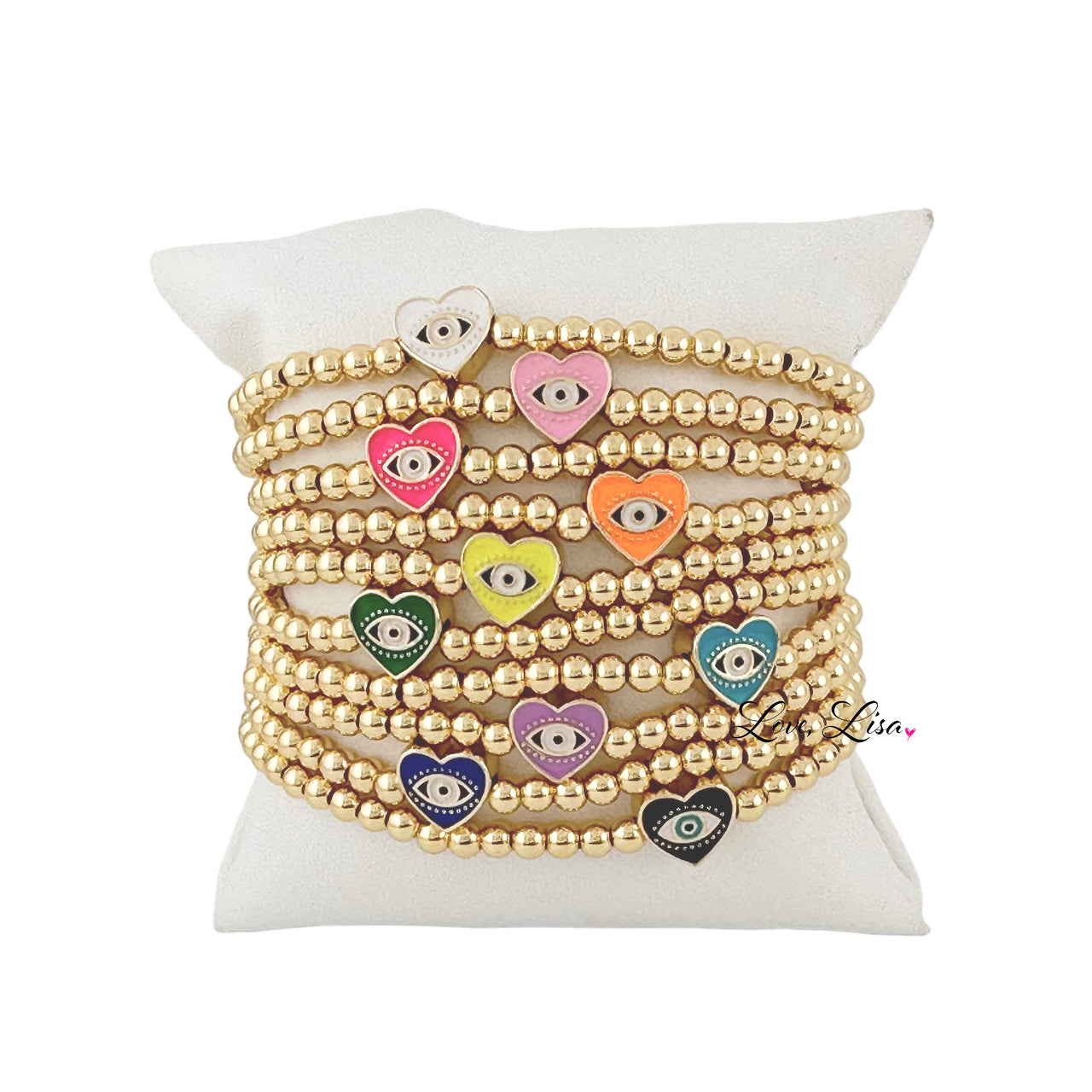 A collection of beaded bracelets with gold-colored beads and multicolored heart charms displayed on a white surface.