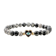 Sandi heart of protection gemstone evil eye bracelet with black jasper beads and heart evil eye charm