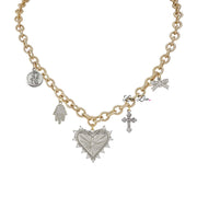 A gold-toned necklace featuring a heart pendant with a bow, a cross, a guardian angel, and a Hamsa charm.