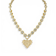 Love Lisa gold crystal heart statement necklace with bezel set stones and vintage inspired pendant