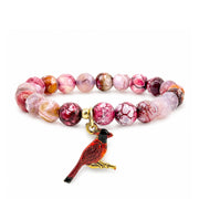 Love Lisa Scarlett Cardinal Gemstone Bracelet in gold finish with red fire agate gemstone beads and red cardinal charm