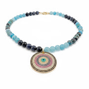 medium blue fire agate gemstone evil eye necklace with crystal pendant