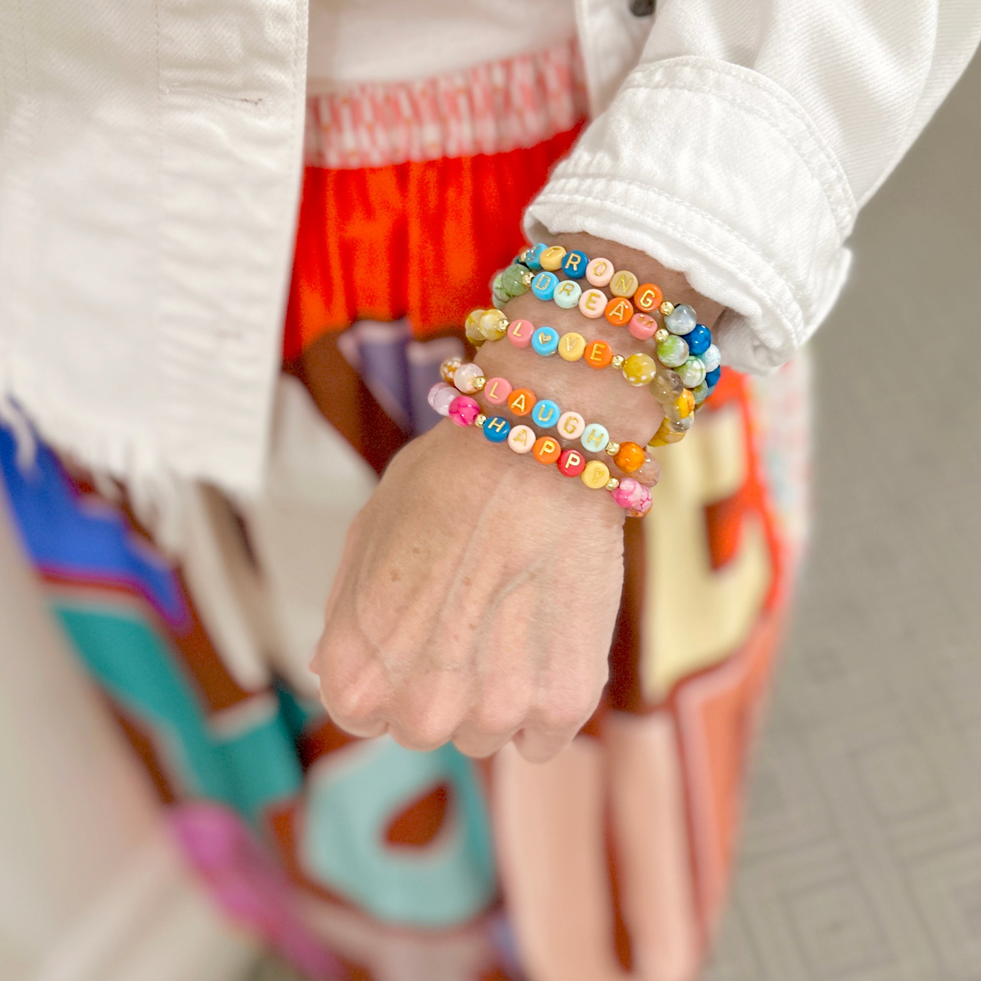 scarlett happy gemstone bracelet stack worn on wrist colorful stretch bracelets