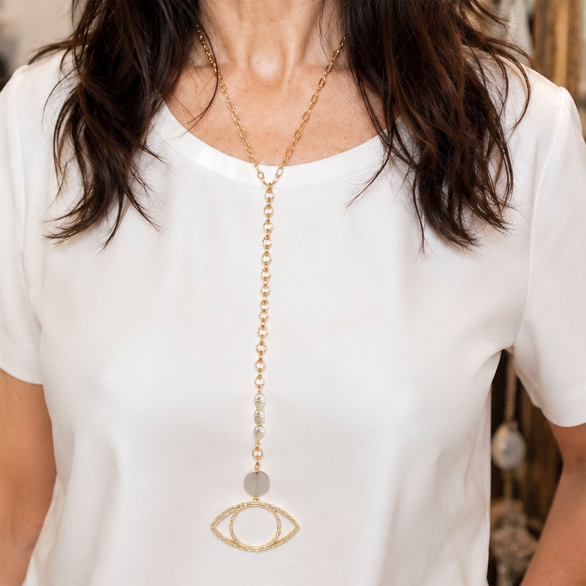 Love Lisa Serena Pearl Drop Long Necklace worn with white top and gold heart charm drop