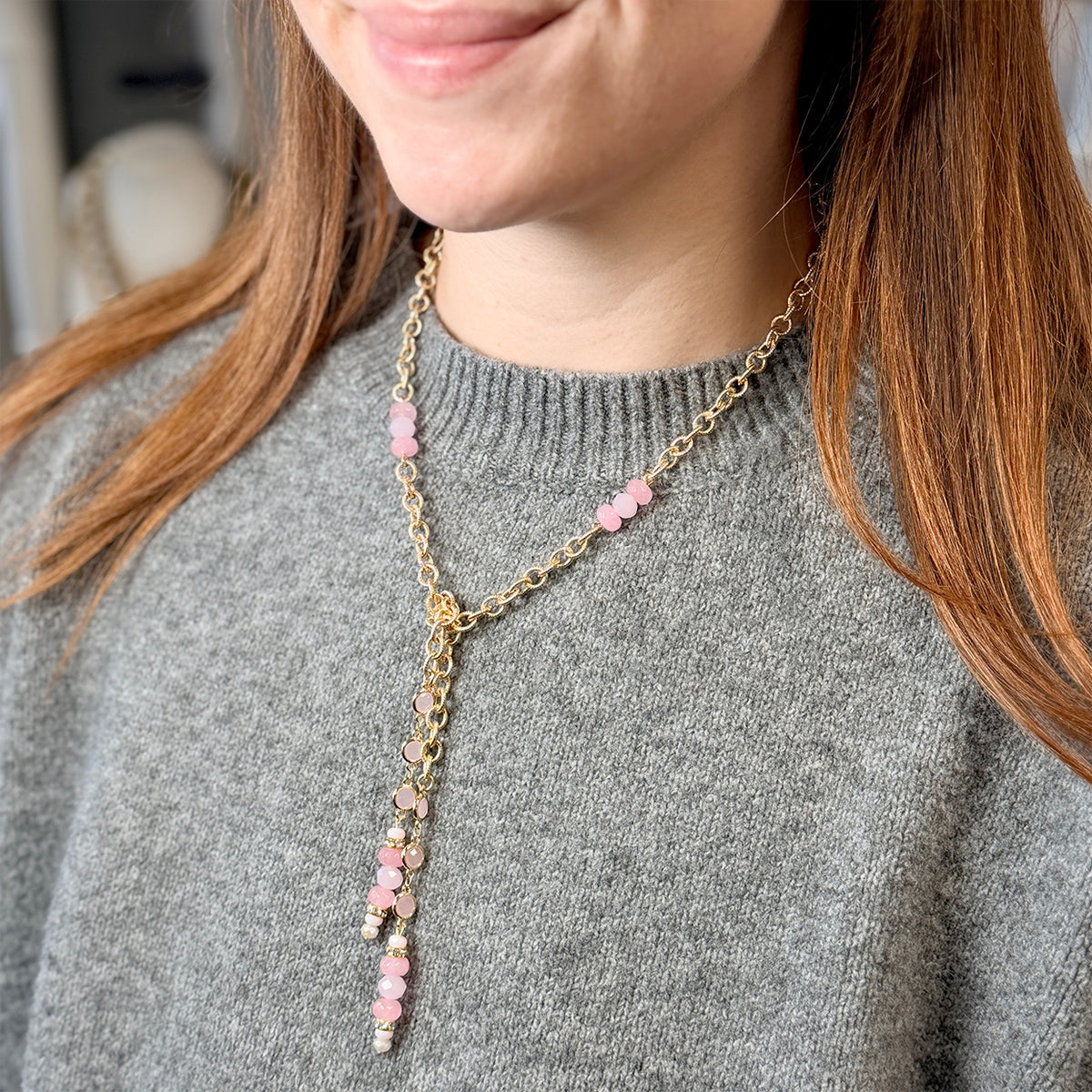 Love Lisa Serenova Pink Lariat Necklace worn with blush glass beads, gold-tone chain details, and an adjustable center drop
