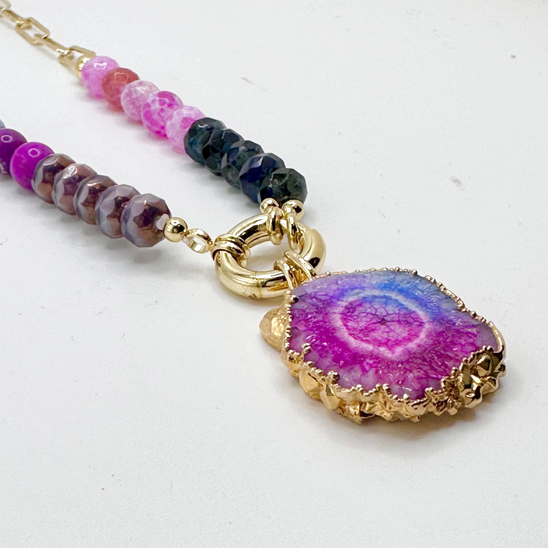 raspberry druzy stone pendant necklace with colorful gemstone beads