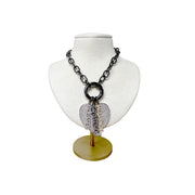 Love Lisa shimmering word charm layered on necklace with heart charm on gunmetal clasp necklace display