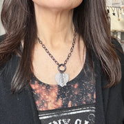 Love Lisa shimmering word charm layered on heart charm necklace 
