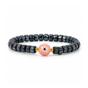 Sienna Ceramic Evil Eye Stretch Bracelet in black with glossy ceramic beads gold-tone accents and ceramic evil eye focal bead