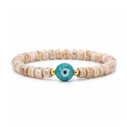 Sienna Ceramic Evil Eye Stretch Bracelet in brown with glossy 6mm ceramic beads gold-tone accents and ceramic evil eye focal bead