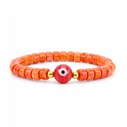 Sienna Ceramic Evil Eye Stretch Bracelet in orange with glossy 6mm ceramic beads gold-tone accents and ceramic evil eye focal bead