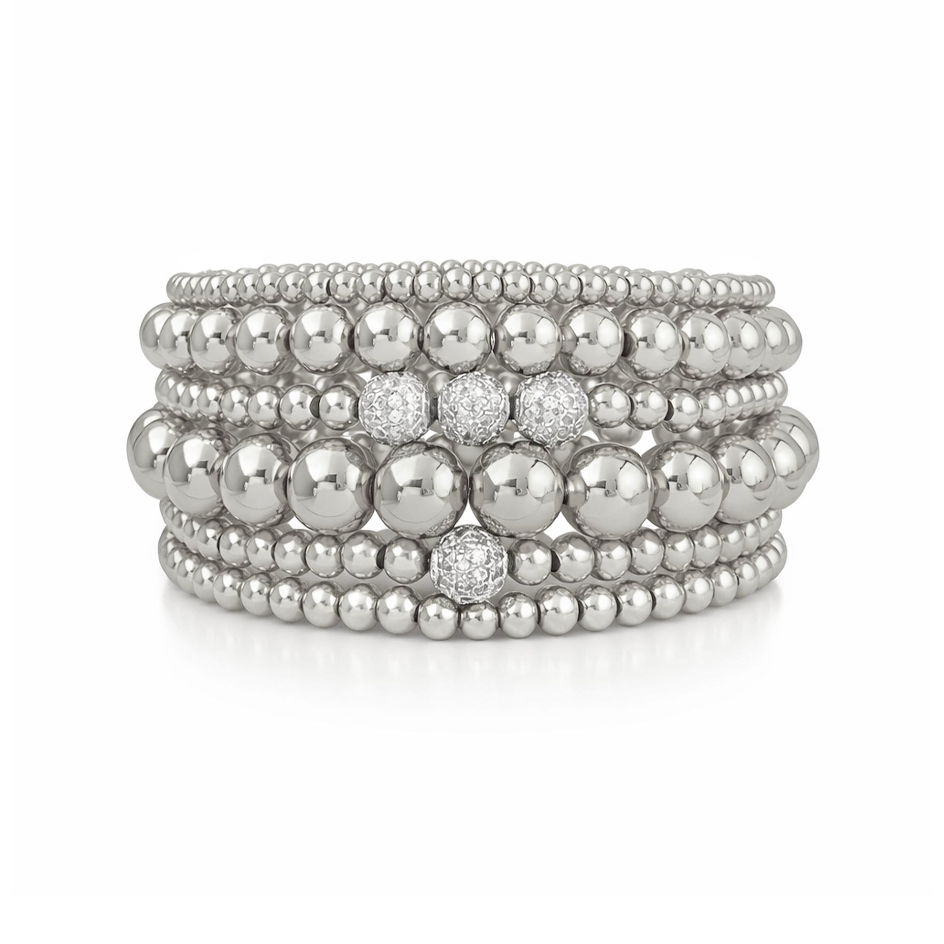 Stack of silver beaded bracelets on a white background
