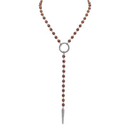 Necklace with brown beads and a silver pendant on a white background