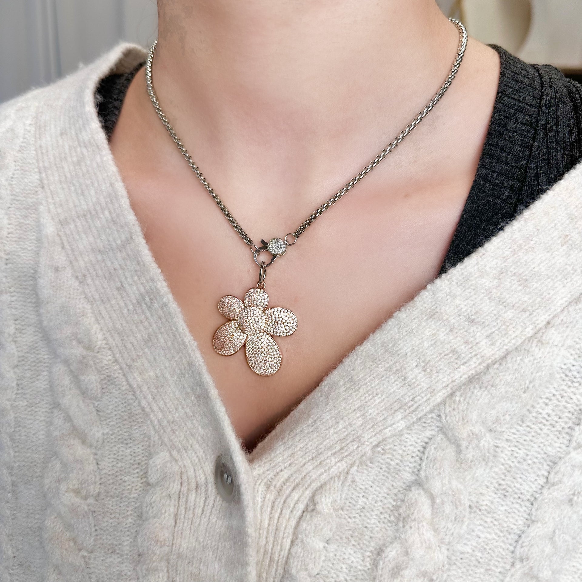 sparkling bloom charm worn on model love lisa necklace