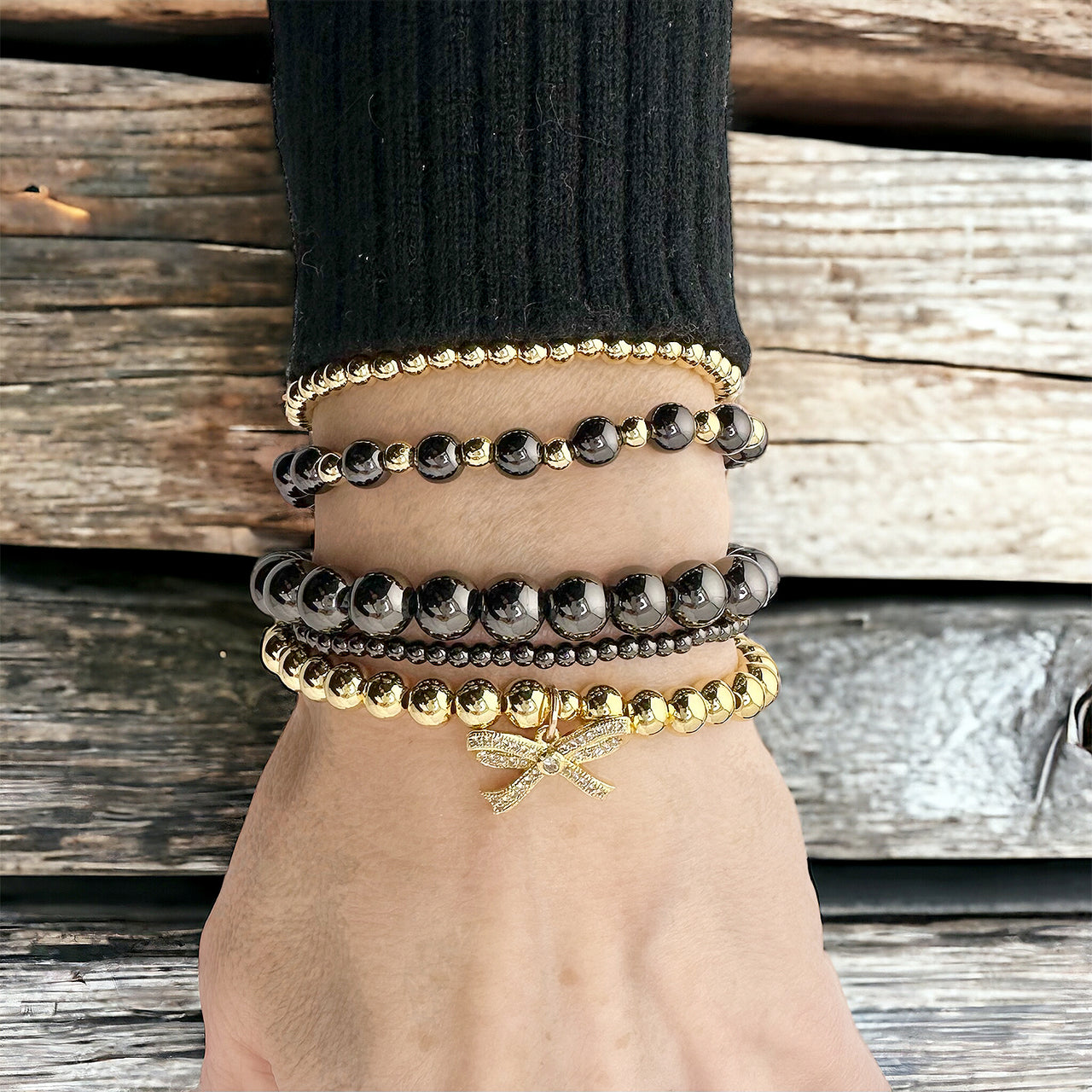 Love Lisa stacy plain beaded stretch bracelet styled in a layered bracelet stack