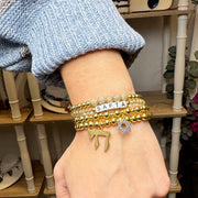 love lisa bracelet stack with star of david and chai charms layered judaica jewelry