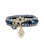 Navy Glow Star of David Evil Eye Hamsa bracelet stack with blue crystal stretch beads