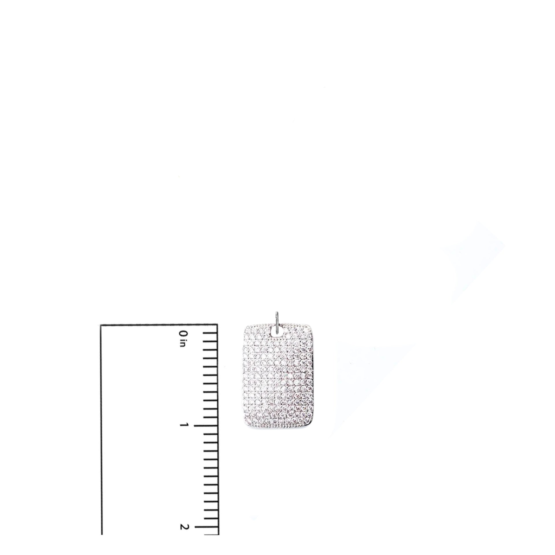 Stella Dog Tag Charm in silver pavé crystals shown next to ruler for scale