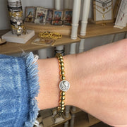 Holy family prayer bracelet gold beaded on model