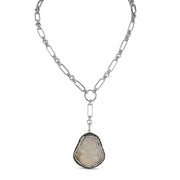 Necklace with a pendant on a white background