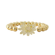 Sunflower beaded stretch bracelet gold with polished metal beads and pave sunflower centerpiece
