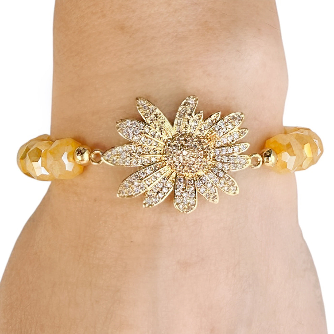Love Lisa sunflower beaded stretch bracelet worn showing pave sunflower centerpiece and stretch bead design
