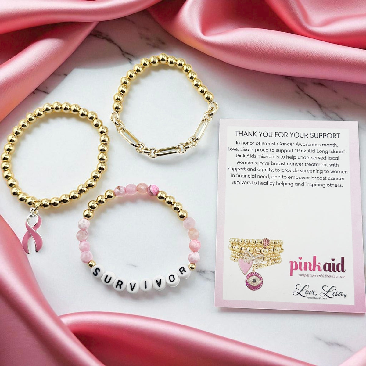 Love Lisa Survivor Breast Cancer Awareness Bracelet Stack displayed with gold and silver finish options, Pink Aid card, and pink ribbon charm