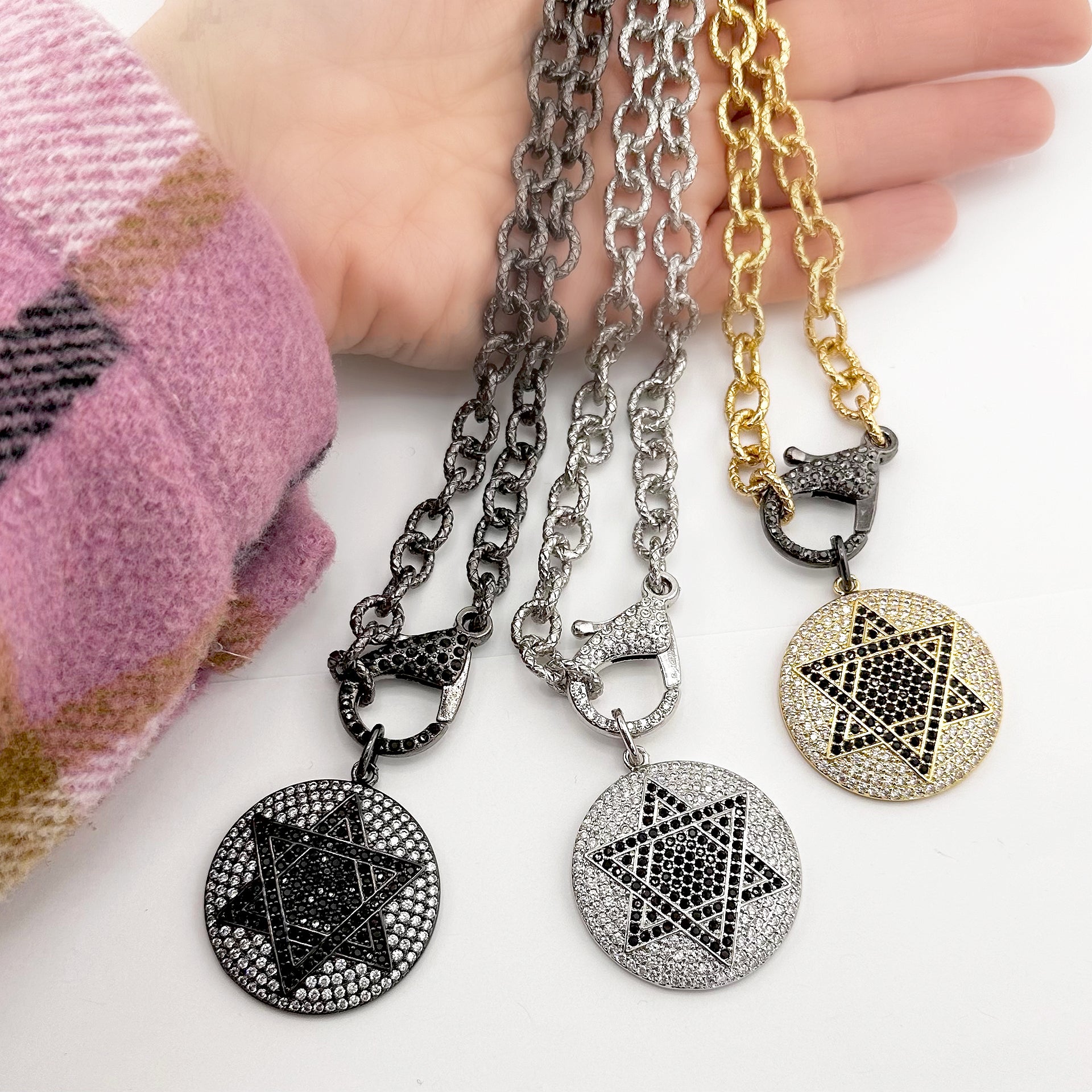 talia star of david necklace on display