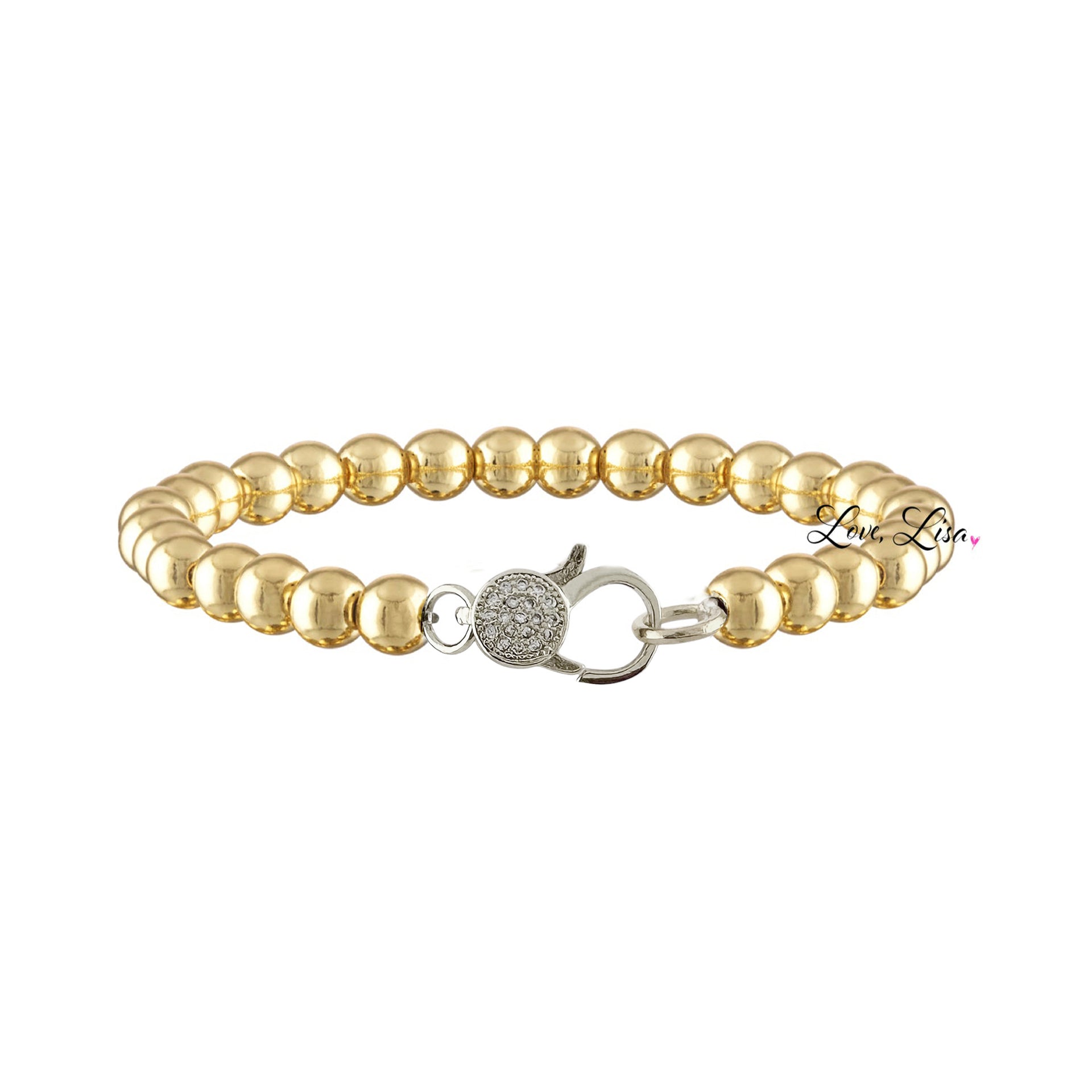 Mixed metal beaded bracelet with pavé crystal clasp designed for charm customization