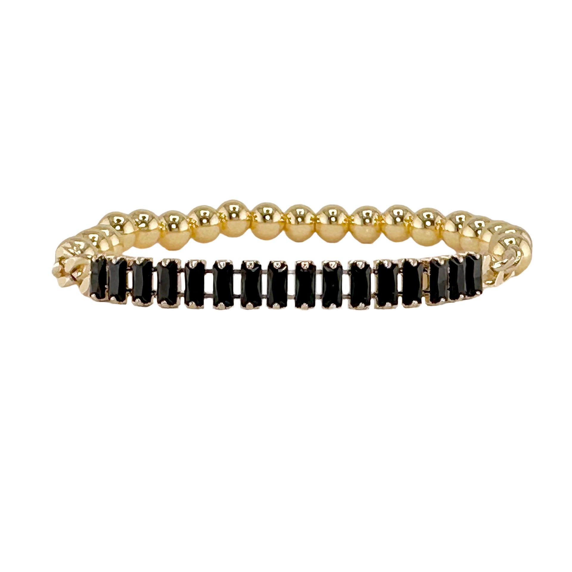 Trae tennis baguette bracelet featuring black baguette crystals on gold tone stretch band
