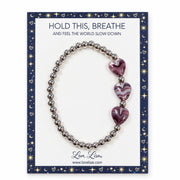 Love Lisa Triple Mini Heart Worry Stone Bracelet displayed on a Hold This Breathe message card with three marbled heart-shaped worry stones and silver-tone beads