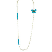 
Turquoise monarch butterfly charm necklace with turquoise crystal beads on gold chain