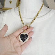 love lisa model wearing luna love heart disc charm gold black pave heart charm on clasp necklace