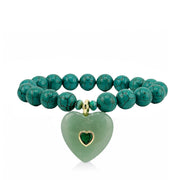 alentina Gemstone Heart Beaded Bracelet in Green with fossil gemstone beads, gold-tone accents, and gemstone heart pendant with crystal heart detail