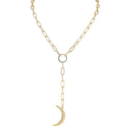 Gold chain necklace with a crescent moon pendant on a white background