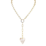 Gold chain necklace with a pearl heart-shaped pendant on a white background