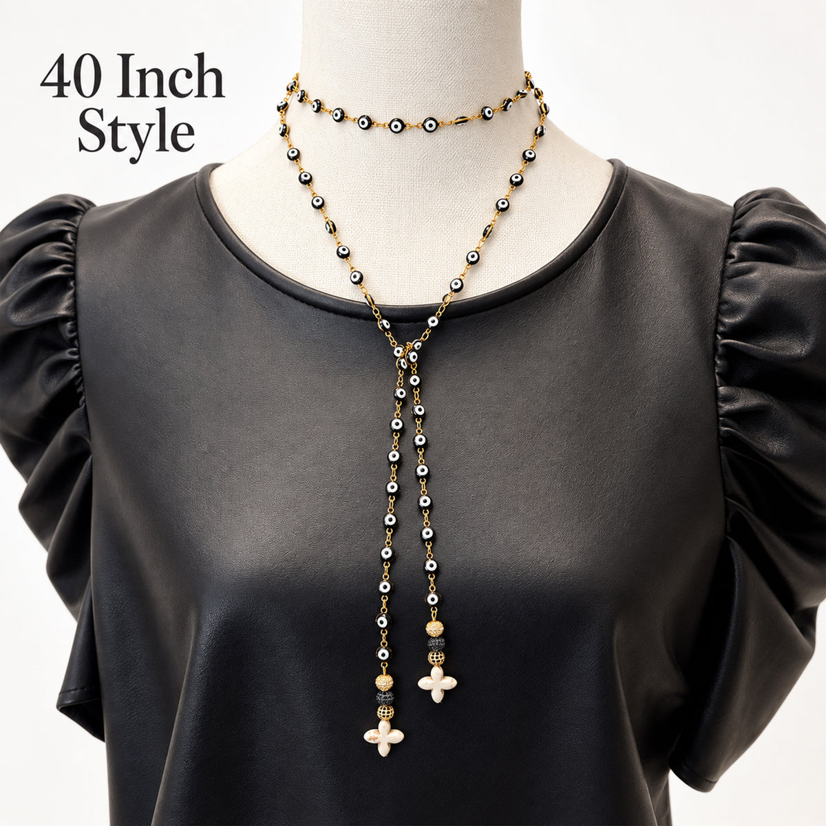 Love Lisa Vittoria 40-inch Wrap Necklace worn wrapped for a layered look with evil eye beads and dangling howlite quatrefoil drops