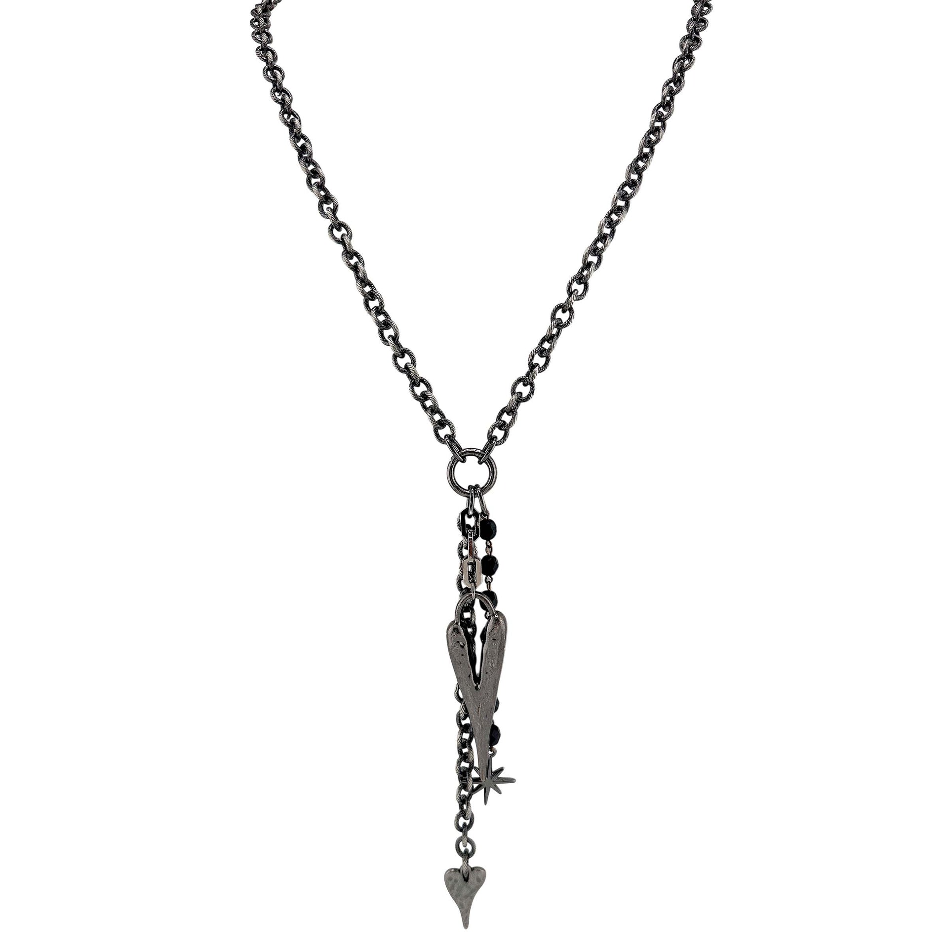 Necklace with heart and star charms on a white background