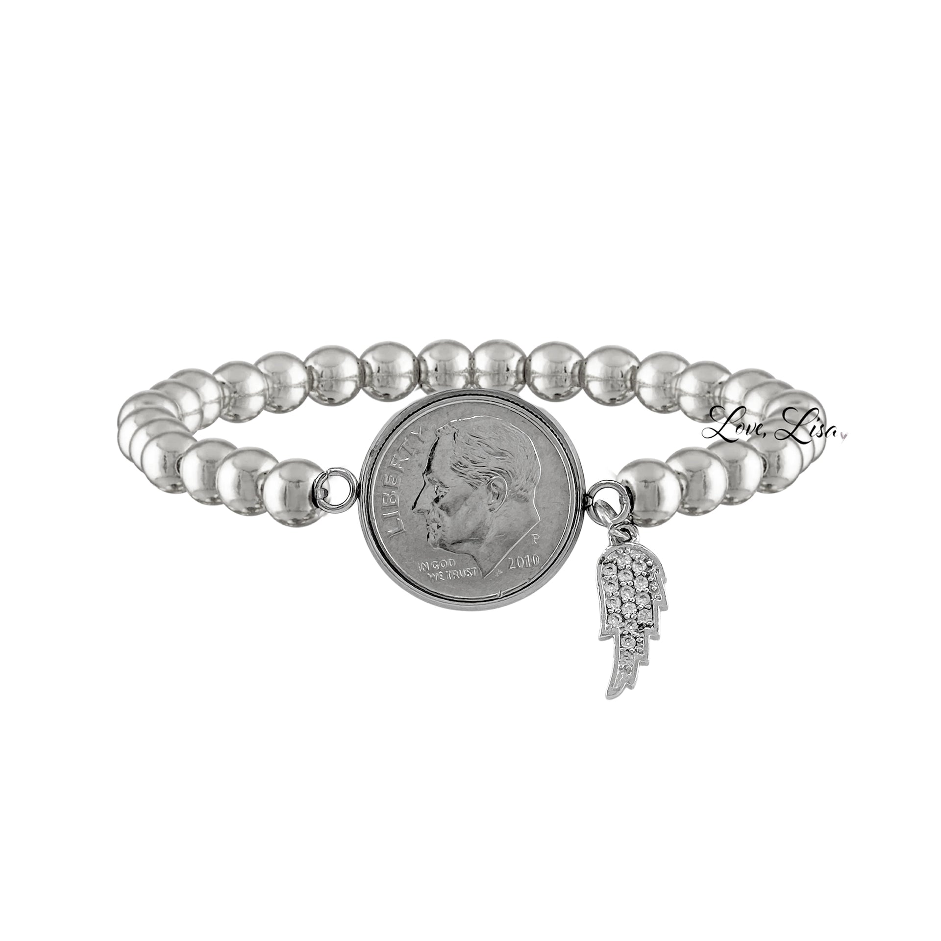 A bracelet with silver-colored beads, featuring a dime charm in the center and a small angel wing charm on the side.