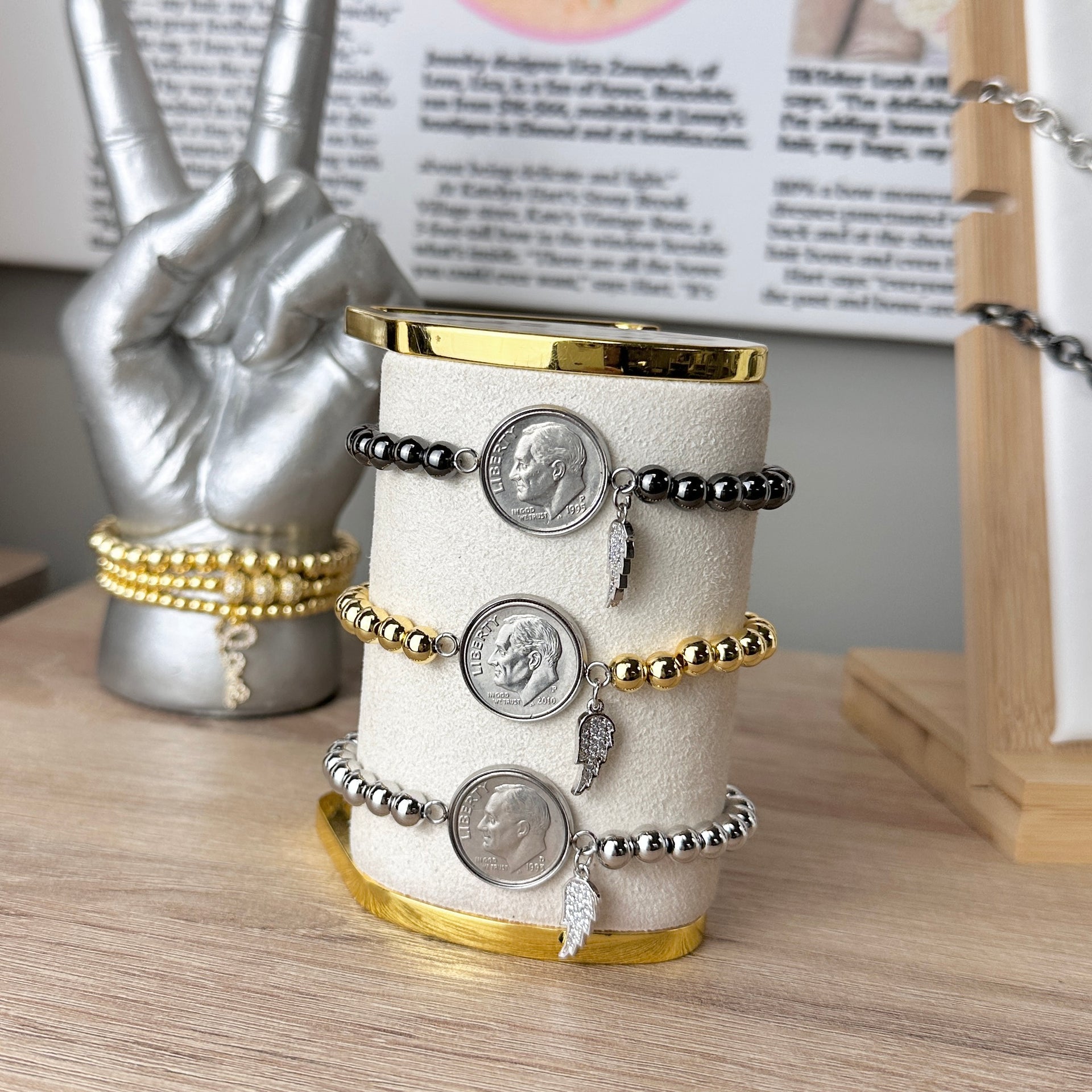 Love Lisa Wings and Wishes dime bracelet stacked style

