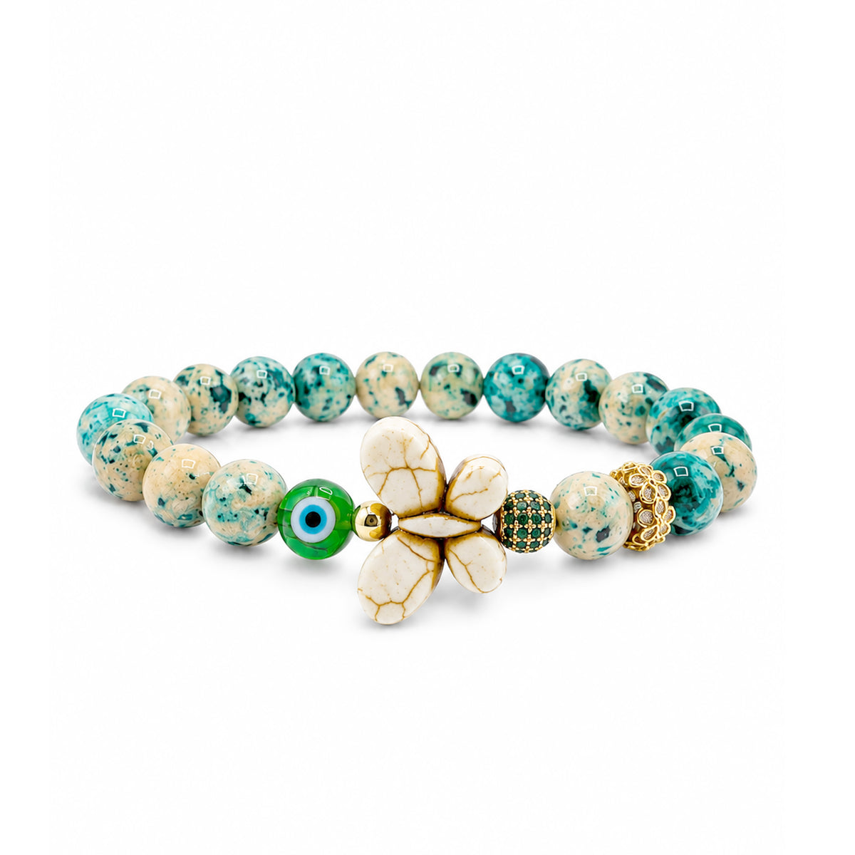 Wish & Wonder Butterfly Sea Sediment Jasper Bracelet in Luck with green beads, white howlite butterfly, green evil eye bead, pavé crystal bead, and gold-tone crystal flower accent bead