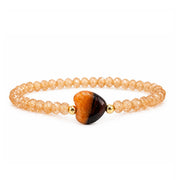 Worry Stone Harper Bracelet in Blush Glow with faceted crystal beads, gold-tone accents, and heart-shaped worry stone focal bead