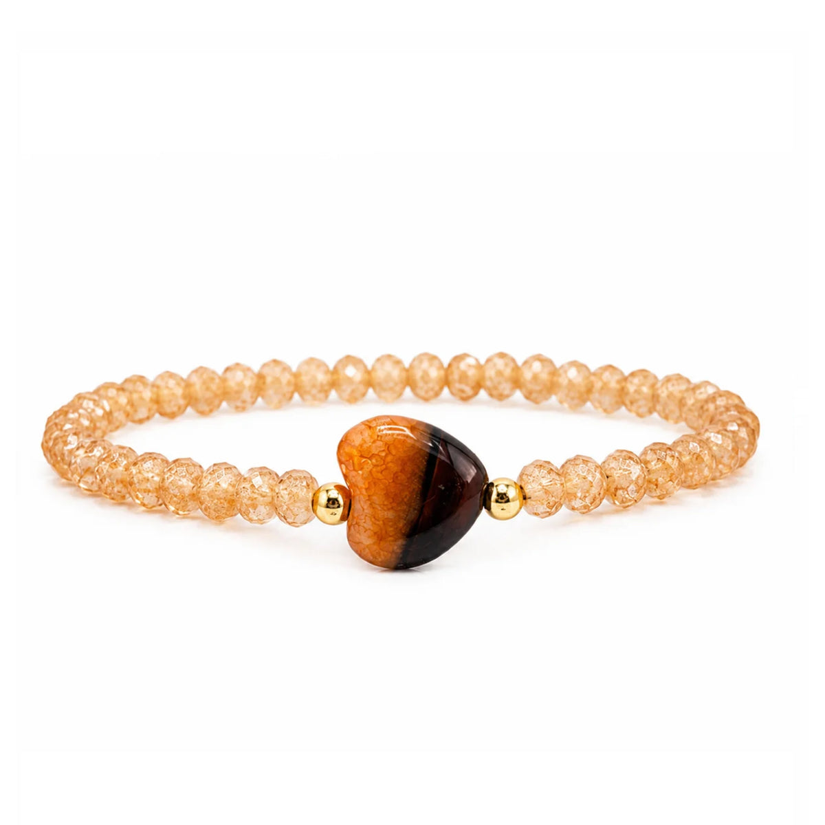 Worry Stone Harper Bracelet in Blush Glow with faceted crystal beads, gold-tone accents, and heart-shaped worry stone focal bead