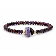 Worry Stone Harper Bracelet in Purple with faceted crystal beads, gold-tone accents, and heart-shaped worry stone focal bead