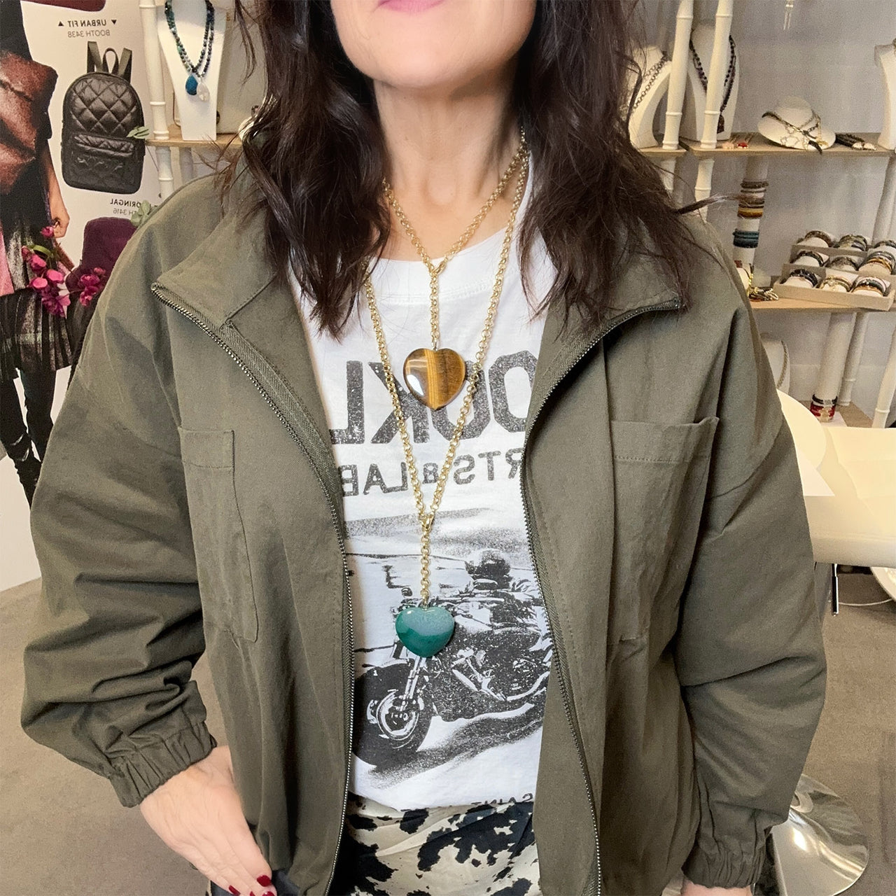 worry stone long heart necklace worn on model gold chain gemstone pendant love lisa