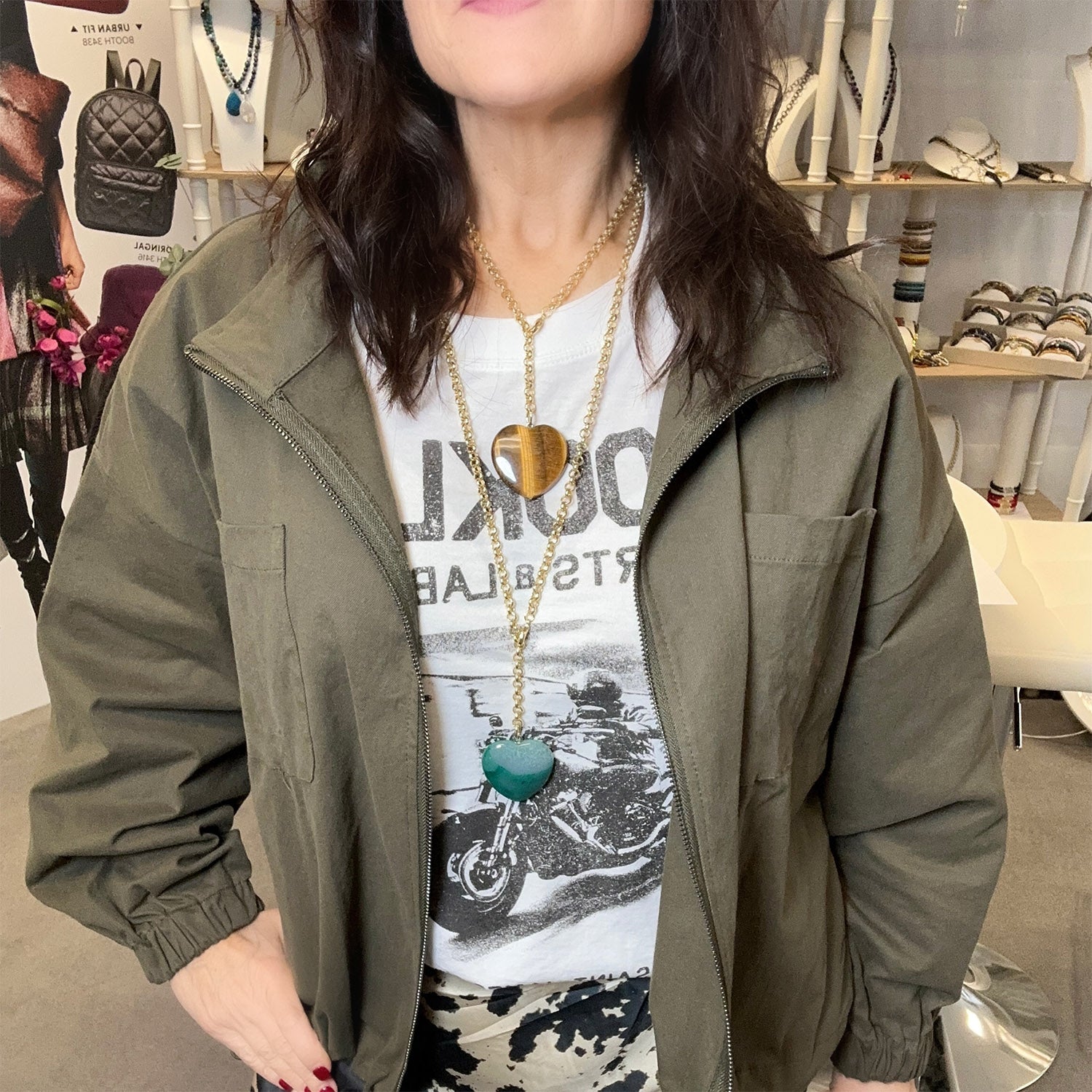 worry stone long heart necklace worn on model gold chain gemstone pendant love lisa