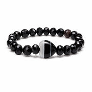 Worry Stone Mixed Gemstone Bracelet in Black with mixed gemstone beads, gold-tone accents, and heart-shaped worry stone focal bead