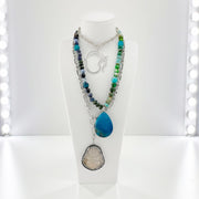 Love Lisa Worry Stone agate Oval Necklace displayed on jewelry stand natural gemstone healing necklace